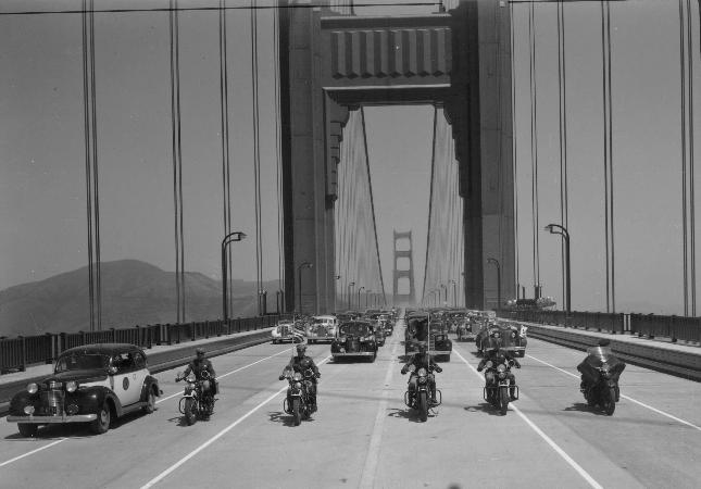 Motorcycles crossing the Bridge on opening day. From the holdings of the Golden Gate Bridge